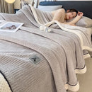 Cozy jacquard plush blanket cream & black bedroom throw
