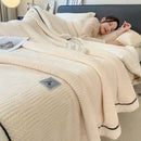 Cozy striped knitted velvet bedroom blanket in cream & black