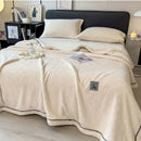 Cozy striped knitted velvet bedroom blanket in cream & black