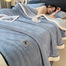 Cozy striped knitted velvet bedroom blanket in cream & black