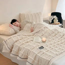 Cream cozy faux rabbit plush blanket bedroom black piping edge