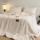 Cream cozy faux rabbit plush blanket bedroom black piping edge
