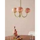 Cream pink bedroom pendant light with three glass globes and brass