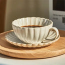 Cream scalloped ceramic afternoon tea cup and saucer dining room set