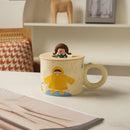 Creative ceramic coffee mug with miniature figurine kitchen decor