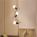 Creative copper iron man chandelier for bedroom articulated art light