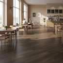 Modern cafe interior with wooden flooring, tables, chairs, and a counter.