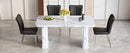 Table and chair set.64.5x35.4 Inch Stylish White Marble Textured Dining Table.Paried With 4 Black PU Chairs with a vertical stripe design on the backrest.Create Your Exclusive Low-Key Luxury Space.