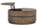 Baisden - Round Lift Top Cocktail Table With Casters - Tobacco