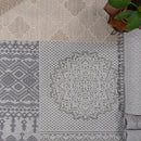 Guros - 6' X 9' Medallion Indoor / Outdoor Area Rug - Gray / White