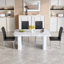 Table and chair set.64.5x35.4 Inch Stylish White Marble Textured Dining Table.Paried With 4 Black PU dining chairs, Silver Metal Legs.Simple and versatile.High Elasticity Sponge Filling.