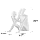 Modern black glossy abstract figure sculpture reading book bedroom decor
