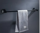 Matte black aluminum bathroom hardware set with towel rack and brush holder