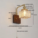 Amber glass and walnut wood wall sconce with pull chain living room