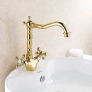 DecorBites™ Antique Brass Basin Faucet with Swivel Spout and Cross Handles