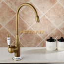 Antique brass kitchen faucet with floral ceramic handle