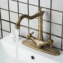Antique brass farmhouse kitchen tap with double cross handles