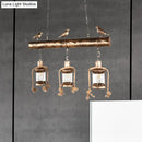 DecorBites™ Antique Brass Lantern Pendant with Clear Glass and Bird Accent - 3-Light Coastal Island Kit