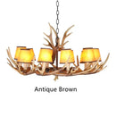 Retro golden brown antler resin chandelier with black shades dining room