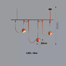 Art deco orange lustre cross belt pendant light – living room