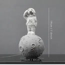 DecorBites™ Astronaut Figurines: Modern Spaceman with Moon Sculpture, Perfect Gift for Man & Boyfriend