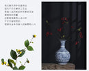 DecorBites™ Blue and White Ceramic Vase - Elegant Home Decor