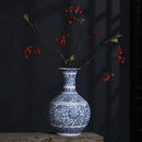 DecorBites™ Blue and White Ceramic Vase - Elegant Home Decor