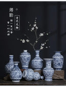 DecorBites™ Blue and White Ceramic Vase - Elegant Home Decor