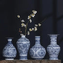 DecorBites™ Blue and White Ceramic Vase - Elegant Home Decor