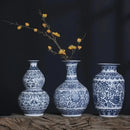 DecorBites™ Blue and White Ceramic Vase - Elegant Home Decor