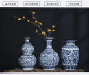DecorBites™ Blue and White Ceramic Vase - Elegant Home Decor