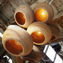 Southeast asian golden ribbed paper pendant light living room