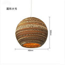 Southeast asian golden ribbed paper pendant light living room