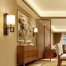 Chinese style cloth wall lamp for bedroom with geometric metal frame