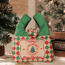 Green and red checkered santa gift bag dining room christmas apple