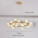 DecorBites™ Contemporary Black and Gold Chandelier - White Glass Ball