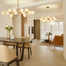DecorBites™ Contemporary Black and Gold Chandelier - White Glass Ball