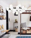 DecorBites™ Contemporary Black and Gold Chandelier - White Glass Ball