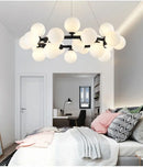 DecorBites™ Contemporary Black and Gold Chandelier - White Glass Ball