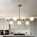DecorBites™ Contemporary Brass Pendant Lamp with 7-Light White Glass, Ideal for Living Room Illumination