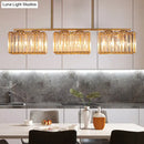 DecorBites™ Contemporary Gold Pendant Lighting for Dining Room - Metal Linear Island Lamp with Clear Cuboid Crystal Shade