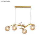 Modern branch gold & black dining room pendant smoke grey cognac glass