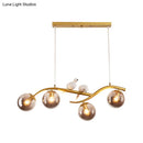 Modern branch gold & black dining room pendant smoke grey cognac glass