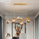 Modern branch gold & black dining room pendant smoke grey cognac glass
