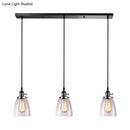 DecorBites™ Farmhouse Multi-Pendant Light Fixture with Ribbed Clear Glass Shades for Dining Room: Linear Canopy, 3 Cone Lights