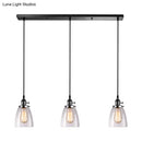 DecorBites™ Farmhouse Multi-Pendant Light Fixture with Ribbed Clear Glass Shades for Dining Room: Linear Canopy, 3 Cone Lights