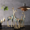 Modern teal & gold giraffe mother sculpture living room decor