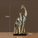 Modern teal & gold giraffe mother sculpture living room decor
