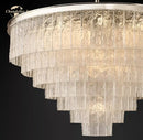 Modern brass glass chandelier dining room cascading textured panels