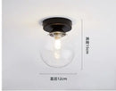 Modern brass & black glass ball ceiling light for living room